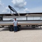 Bill, his dog and a Manitou Pontoon 14